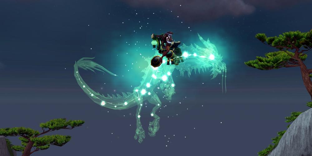 A female night elf riding Shaohao&apo;s Sage Serpent - a transparent, glassy, green cloud serpent (a Chinese-style dragon) containing a constellation of stars that run along its major skeleton points and surrounded by a cloud of green mist - against a Pandaris night sky with a couple of rock pinnacles in the foreground, capped by stunted yew trees.